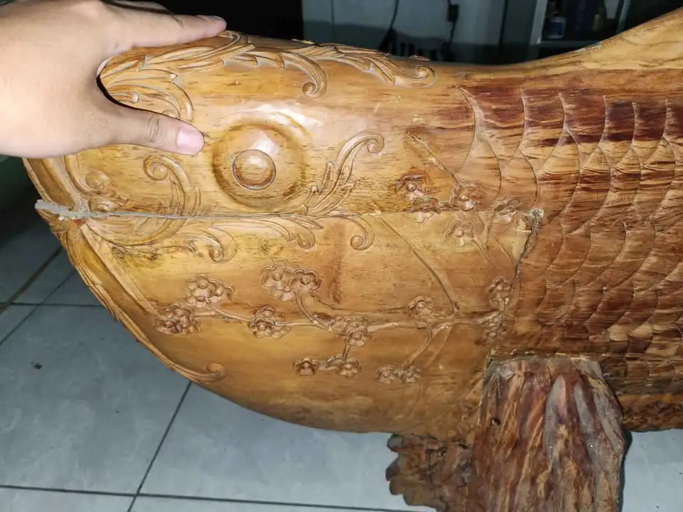 Patung Arwana Pinus