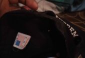 Topi supreme logo S