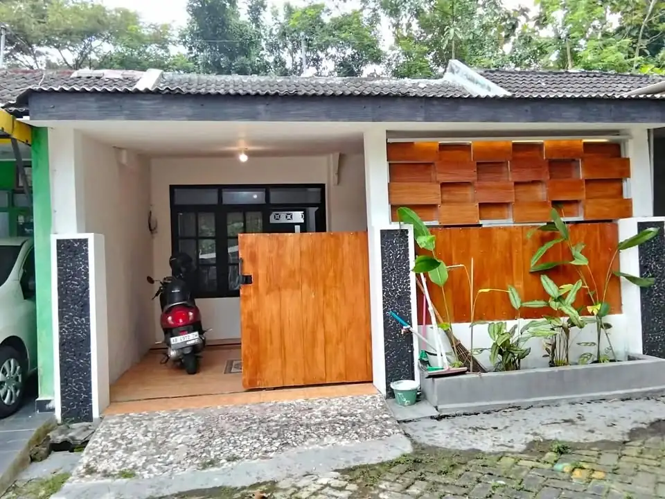 Di Kontrakkan Rumah