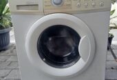 Mesin cuci front loading LG inverter