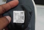 Sepatu running NB