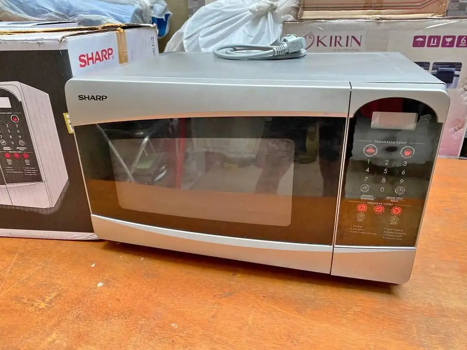 MICROWAVE SHARP R25C1 (S)IN-SILVER seken murah