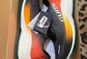 Sepatu running gumi