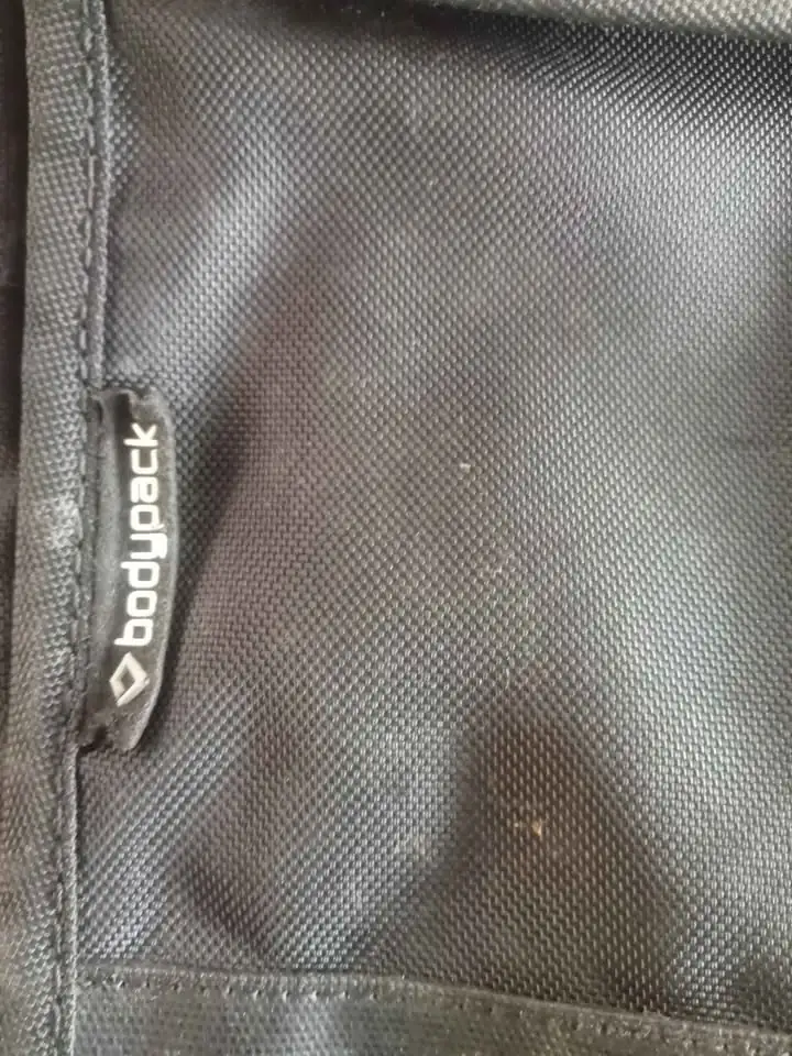 TAS SELEMPANG BODYPACK SLIM 1.0 TRAVEL POUCH
